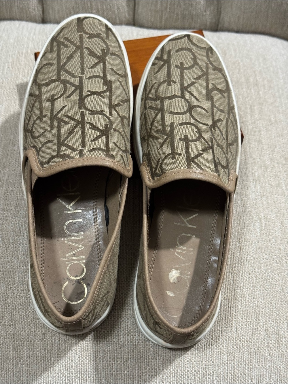 Woman’s Slip-On Canvas Sneakers in Beige/Brown CK logo size 7.5
